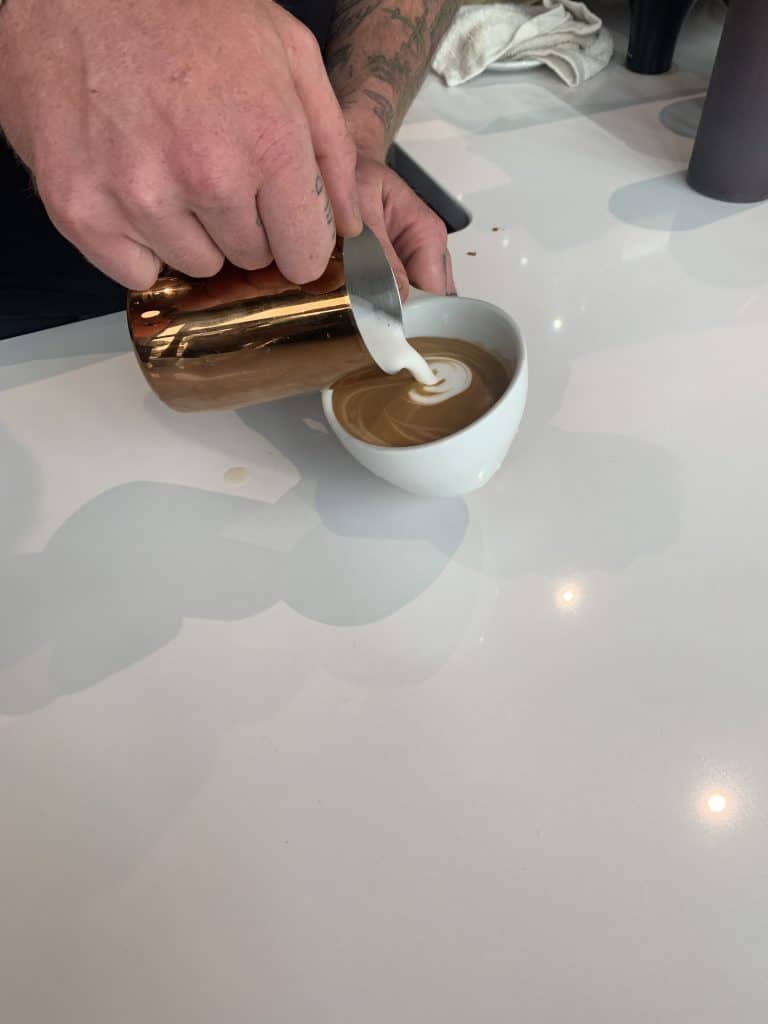 Latte artwork at Stoked Coffee Roasters