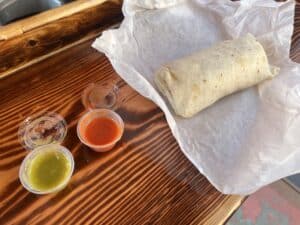 House Made Salsa and sauce and breakfast burrito at Start Up Coffee