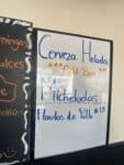 Whiteboard sign reading Cerveza Helada Cold Beer, Micheladas and Flautas de Pollo $15 at Mi Lindo Colima Mexican restaurant in Odell, Oregon