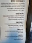 Lilos BBQ sesame ginger salad menu with romaine, mandarin oranges, mushrooms, carrots, and crispy noodles in Hood River