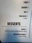Lilos BBQ menu showing pork and chicken add-ons priced five dollars in Hood River