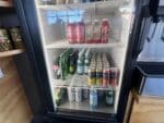 Pelinti Pizza beverage cooler with bottled drinks in Hood River