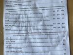 Pelinti Pizza salads and sandwiches menu board in Hood River