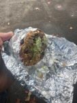 Burrito with extra vegetables cut open in foil from La Sierrita food truck in Hood River, Oregon